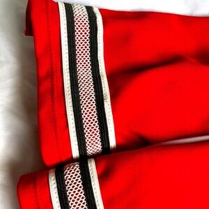 Red Devilish cheerleading skirts